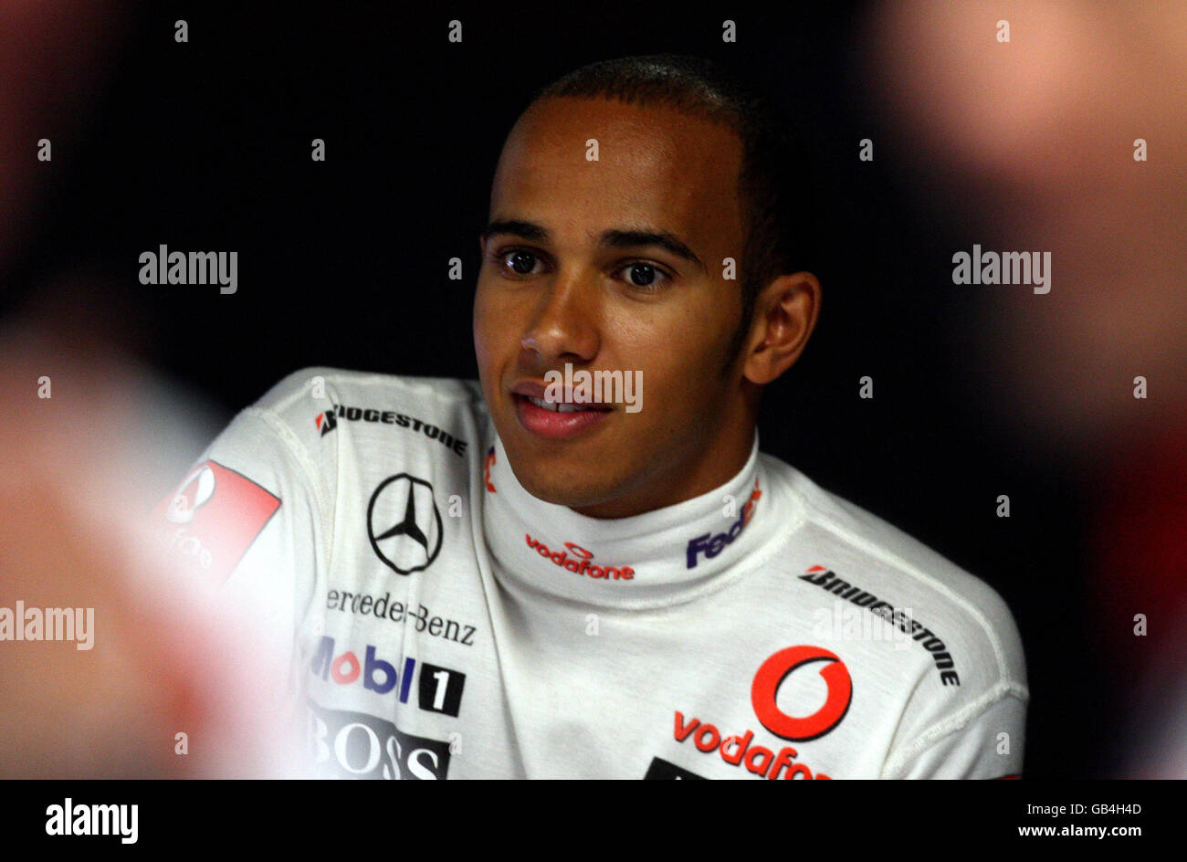 Great Britain's Lewis Hamilton waits in the garage during a practice session at Monza, Italy. Stock Photo