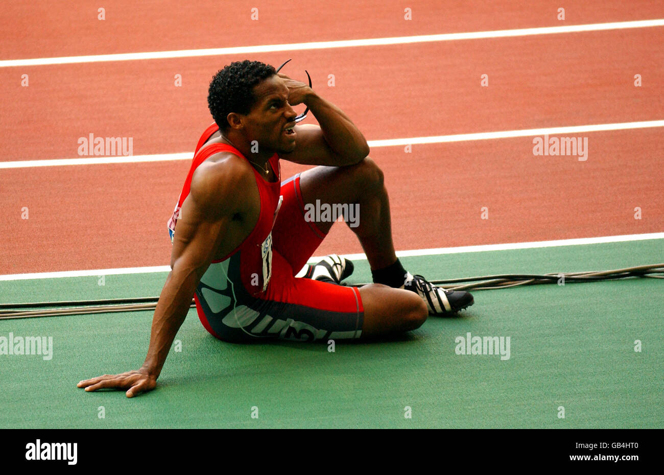 Trinidad and Tobago's Ato Boldon awaits confirmation on the 100m placings Stock Photo