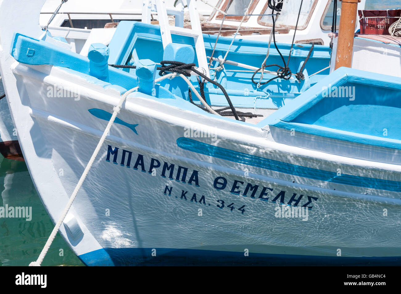 Reflections on bow of traditional fishing boat, Pothia (Pothaia), Kalymnos, The Dodecanese, South Aegean Region, Greece Stock Photo