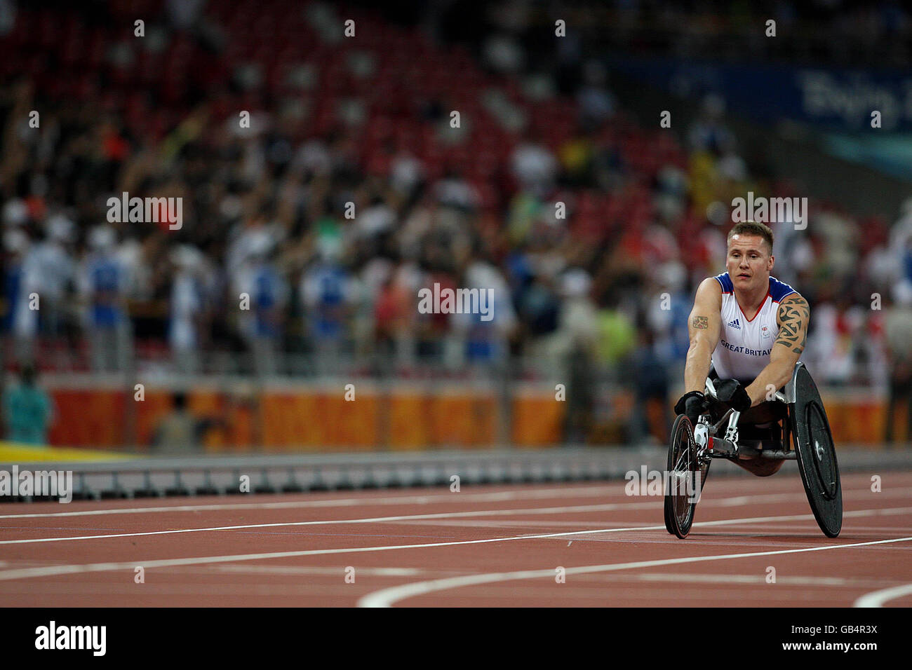 Great Britain's David Weir appears dejected after finishing his men's 400M Final in the National Stadium at the Beijing Paralympic Games 2008, China. Stock Photo