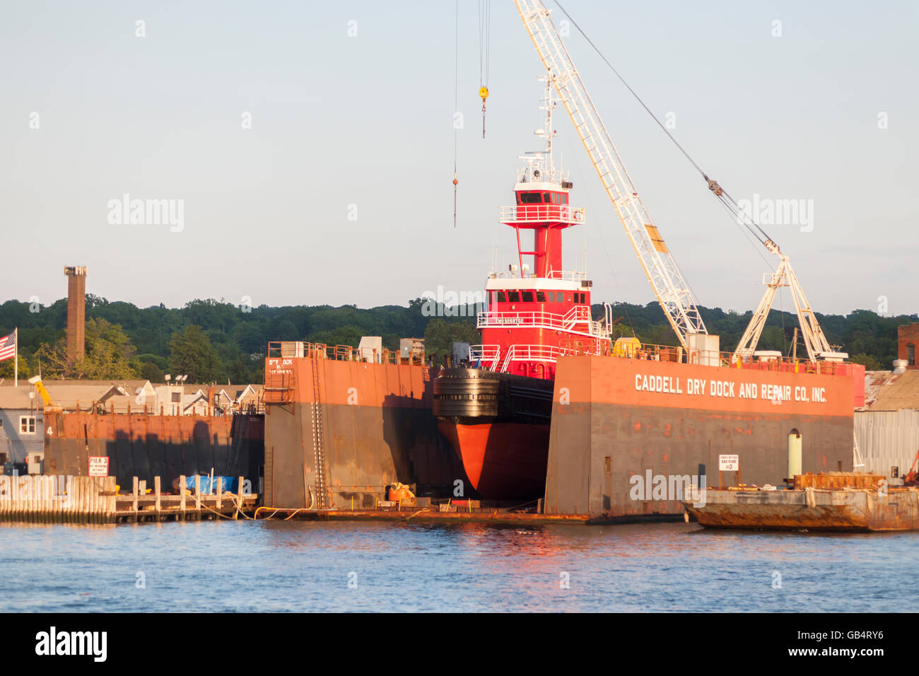 An tugboat undergoes repairs at the Caddell Dry Dock and Repair