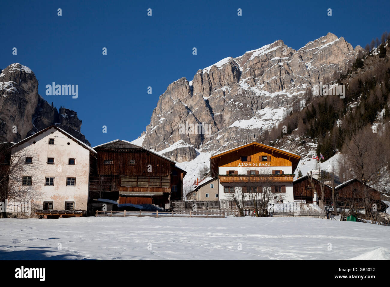 Houses in front of the Sella massif, Kolfuschg, Colfosco, Val Badia, Alta Badia, Dolomites, South Tyrol, Italy, Europe Stock Photo