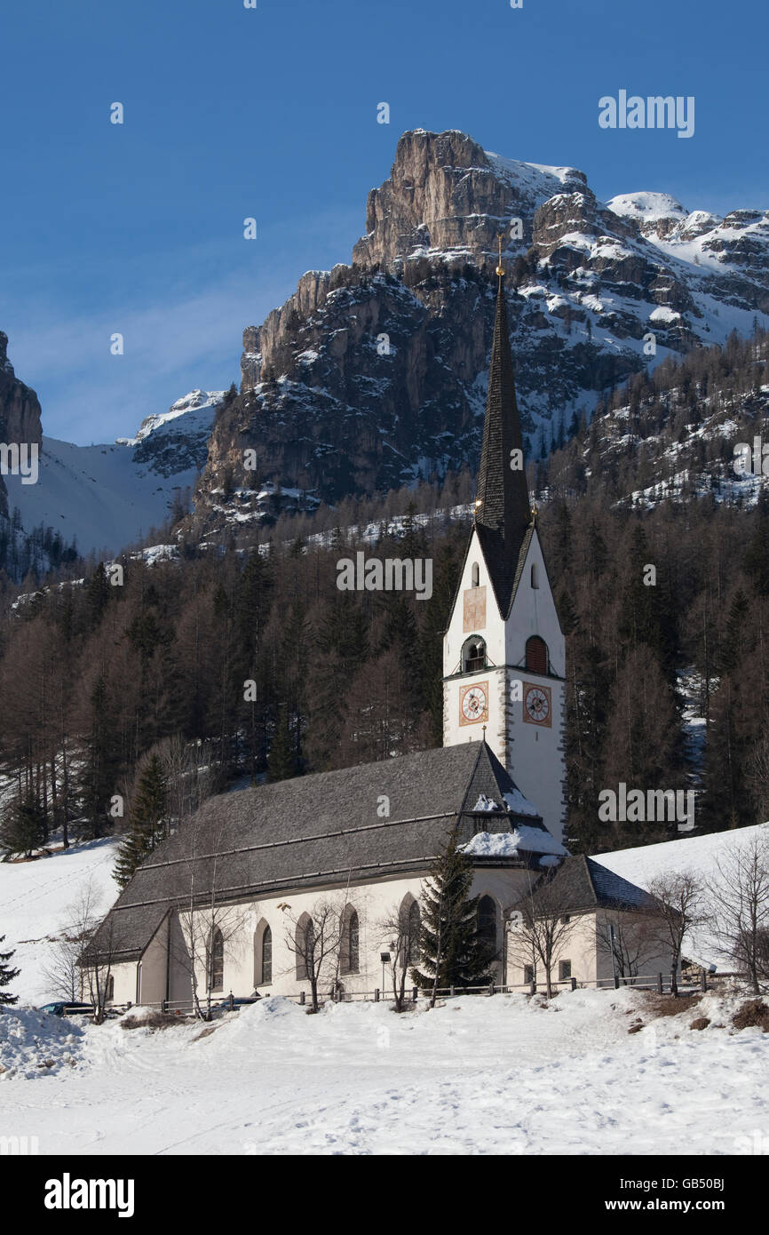 Church in front of the Sella massif, Stern locality also known as La Villa, Abtei, Badia, Gadertal valley, Dolomites Stock Photo