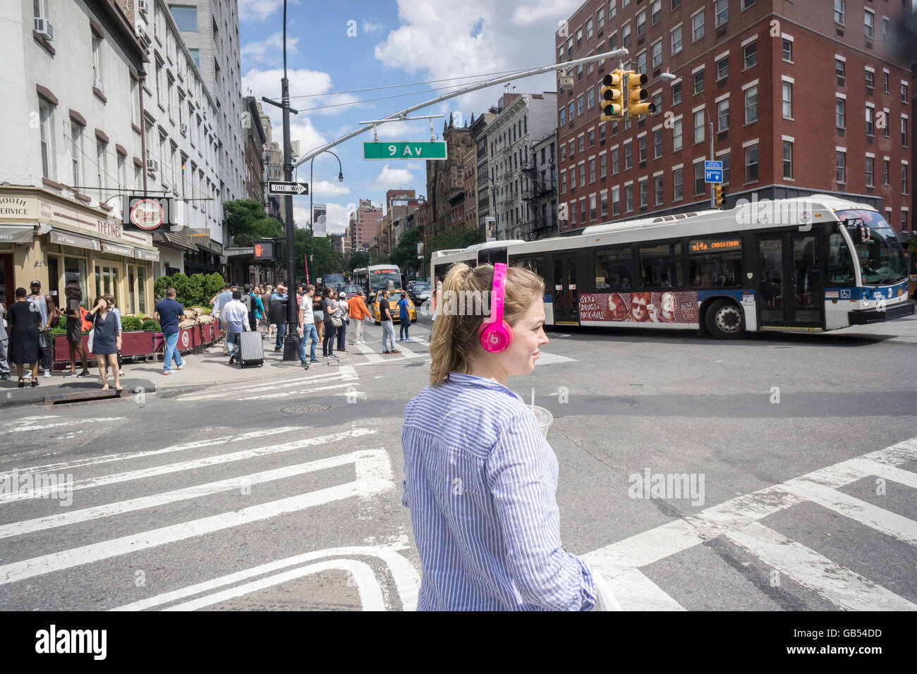 A millennial wearing her Beats by Dr. Dre headphones in New York on Tuesday, July 5, 2016.  (© Richard B. Levine) Stock Photo