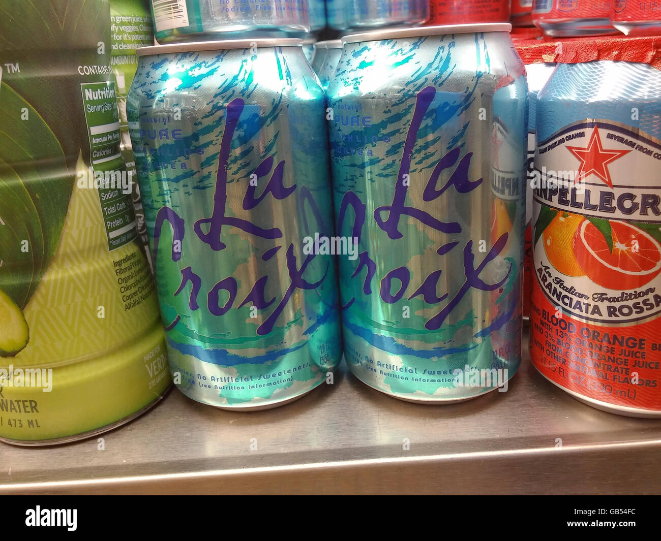Cans of LaCroix sparkling water in a deli in New York on Monday, July 4, 2016. LaCroix eschews traditional advertising instead relying on their manipulation of social media to attract their millennial demographic. Sales have gone from $65 million in 2010 to $226 million in 2015 making it the number brand of flavored sparkling water in the U.S. (© Richard B. Levine) Stock Photo