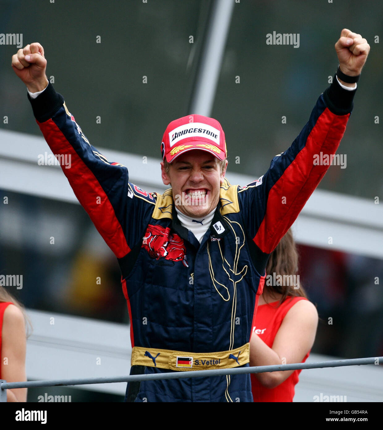 Toro Rosso driver Sebastian Vettel celebrates his victory in the Italian  Grand Prix at Monza, Italy Stock Photo - Alamy