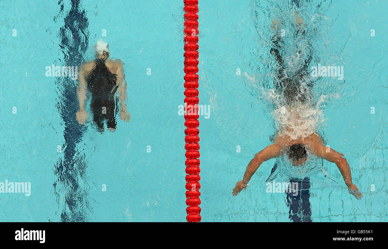 Competitors take part in the Men's 4X50M Medley Heats in the National Acquatic Centre, Beijing. Stock Photo