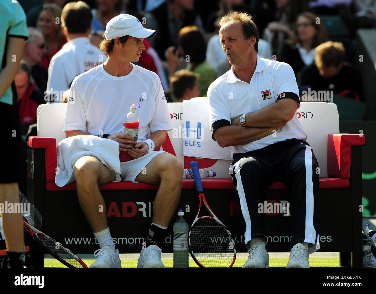 Great Britain's Andy Murray (left) talks to team captain John Lloyd during the Davis Cup, World Group, Play-Offs at The All England Lawn Tennis Club, Wimbledon, London Stock Photo - Alamy