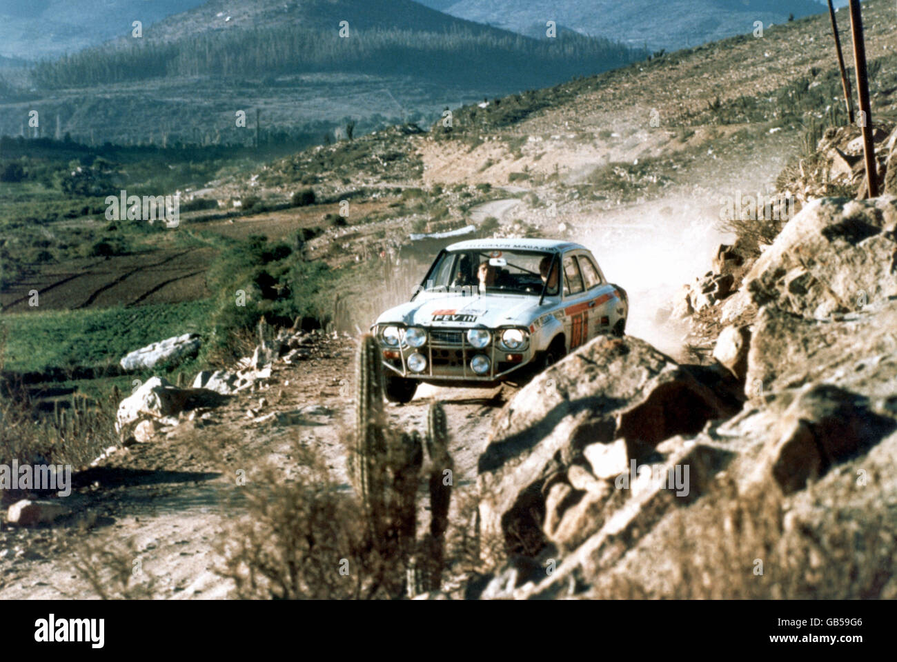 Rallying - Daily Mirror London-Mexico World Cup Rally. Hannu Mikkola and Gunnar Palm driving their Ford Escort through the desert of Southern Mexico Stock Photo