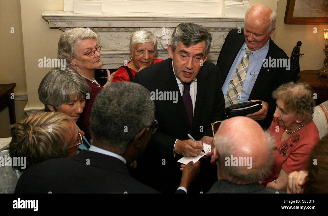 Brown holds reception for pensioners Stock Photo