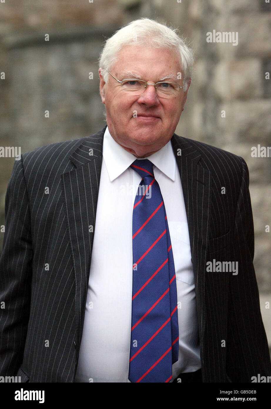 Coroner Dewi Pritchard Jones arrives at the inquest of Michael Todd