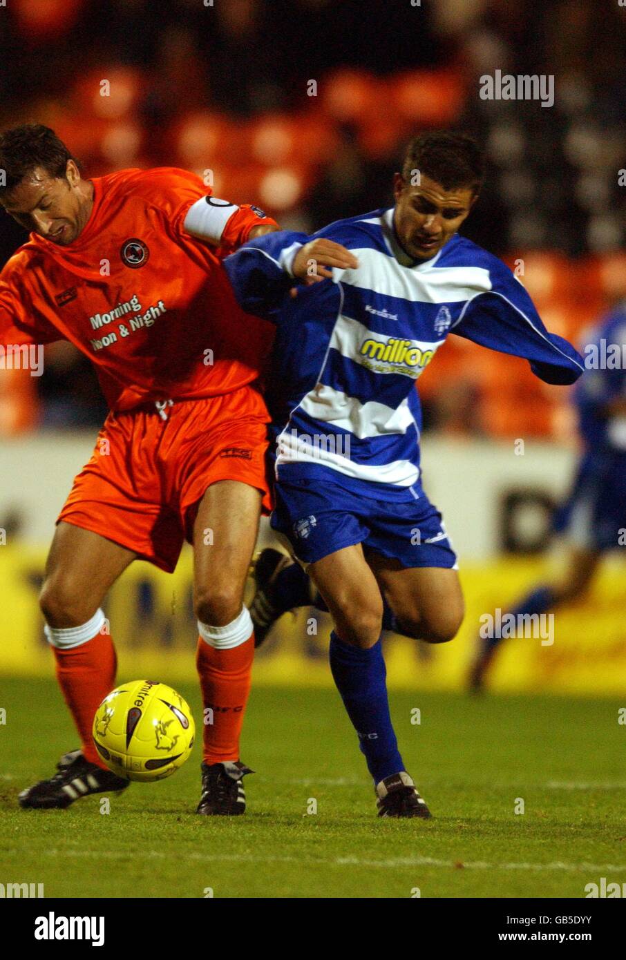 Dundee United's Derek McInnes battles for the ball with Peter Weatherston of Morton Stock Photo