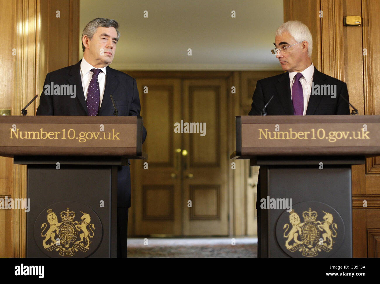 Prime Minister Gordon Brown and Chancellor Alistair Darling speaks during a press conference at 10 Downing Street, London. Stock Photo