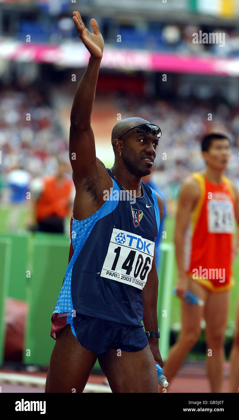 Usas allen johnson celebrates after winning the 100m hurdles final hi