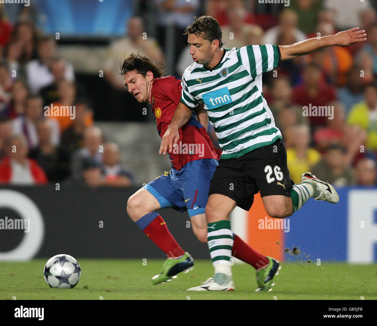 Barcelonas lionel messi and sporting lisbons fabio rochemback hires