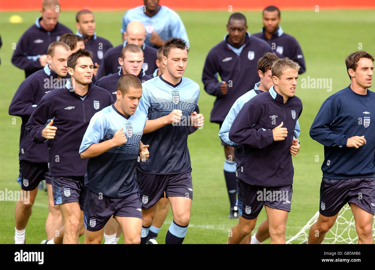 England players train at Manchester United's Cliff Training Ground (in the foreground l-r Danny Murphy, Frank Lampard, Joe Cole, Wayne Rooney, John Terry, Phil Neville and Gary Neville) Stock Photo
