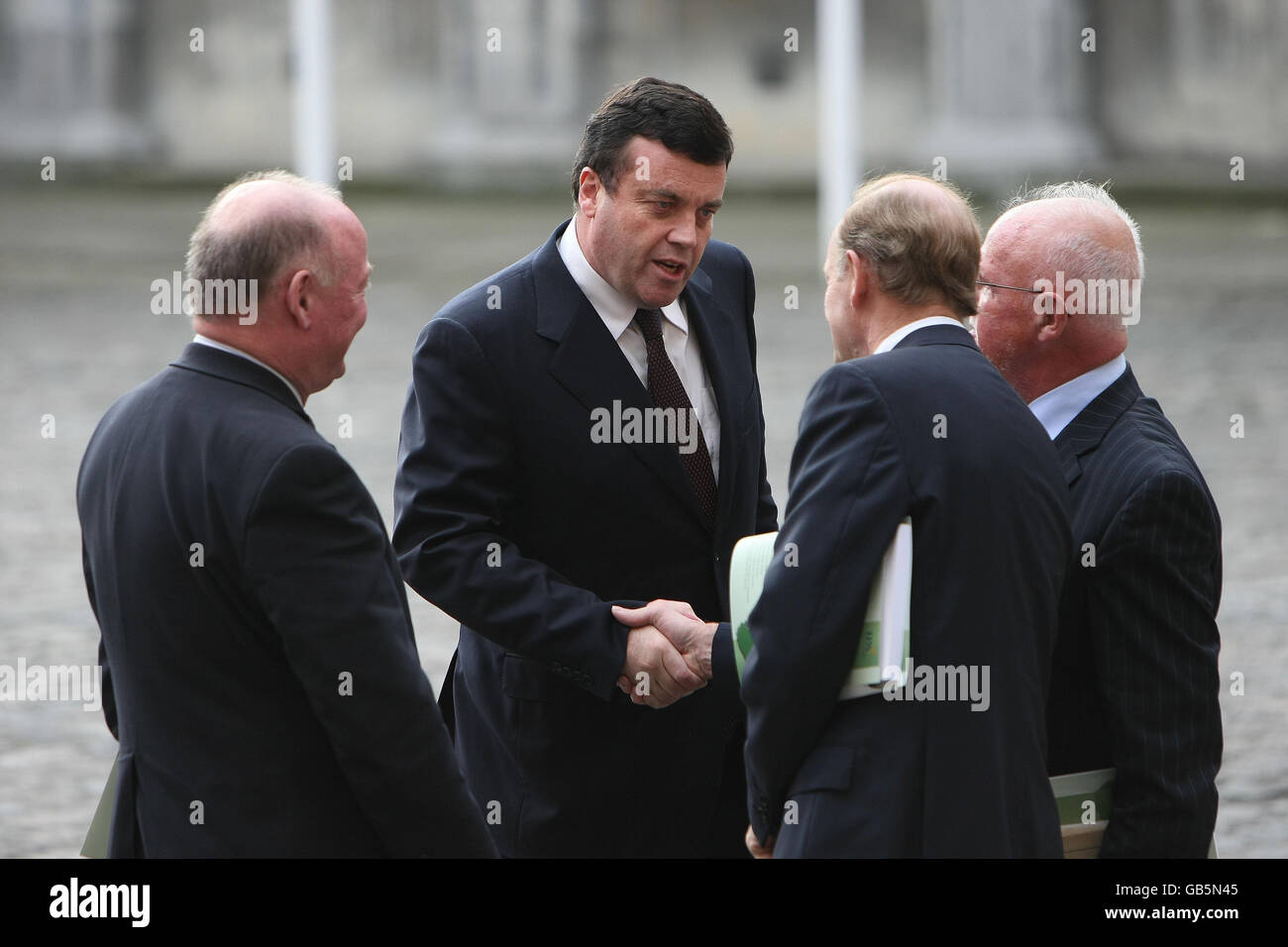 Finance Minister Brian Lenihan meets senior civil servants as he arrived to address the Institute of Public Administration's economic conference at Dublin Castle. Stock Photo