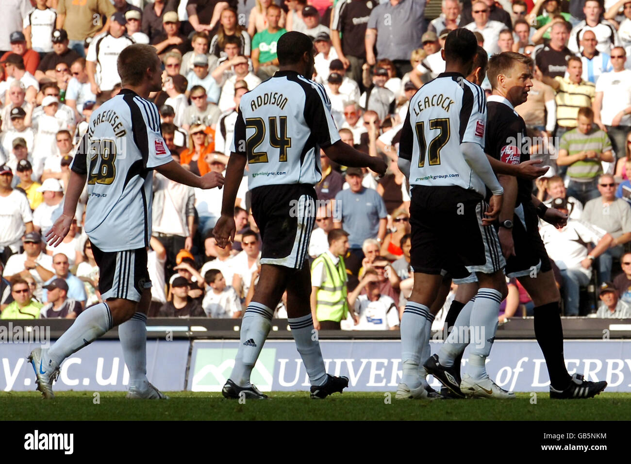 Derby County's Matin Albrechtsen, Miles Addison and Dean Leacock appeal to referee Mark Haywood after giving Cardiff City a penalty Stock Photo