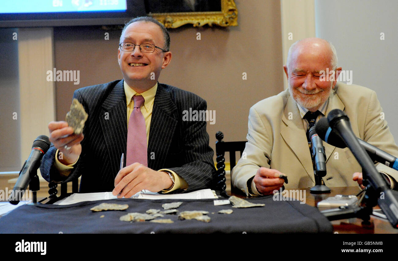 (left to right) Professor Timothy Darvill, Director of the Centre for Archaeology, Anthropology & Heritage, at Bournemouth University and Professor Geoffrey Wainwright, President of the Society of Antiquaries of London, hold pieces of bluestone taken from the Preseli Hills, in west Wales, during a news conference in London following an excavation at Stonehenge. Stock Photo