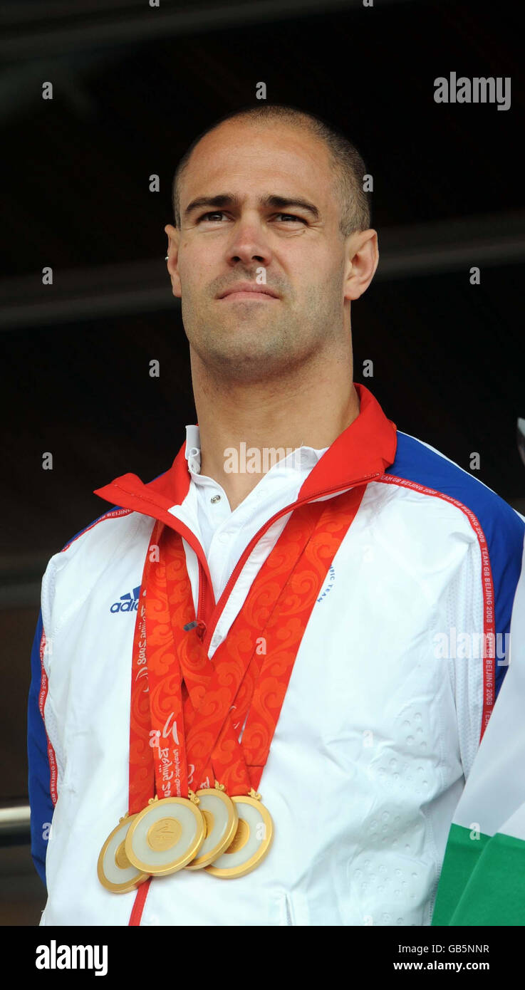 Swimmer david roberts with his four gold medals hires stock