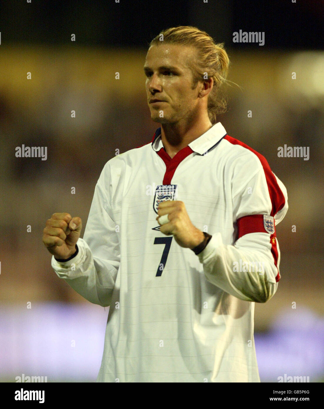 England's David Beckham celebrates at the end of the game after the 2-1 ...
