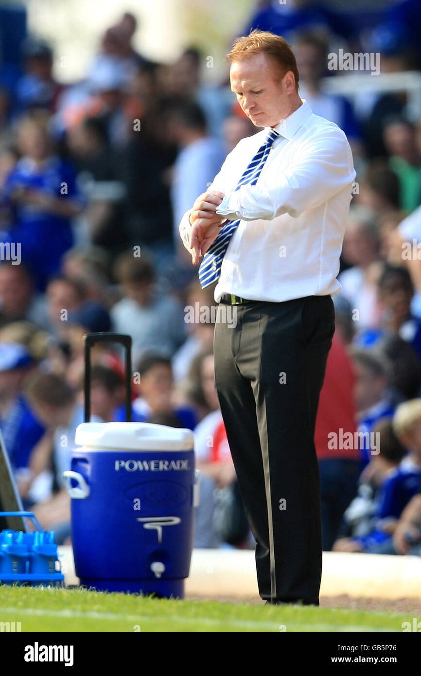 Soccer - Coca-Cola Football League Championship - Birmingham City v Blackpool - St Andrews Stadium. Birmingham City's Manager Alex McLeish checks his watch Stock Photo