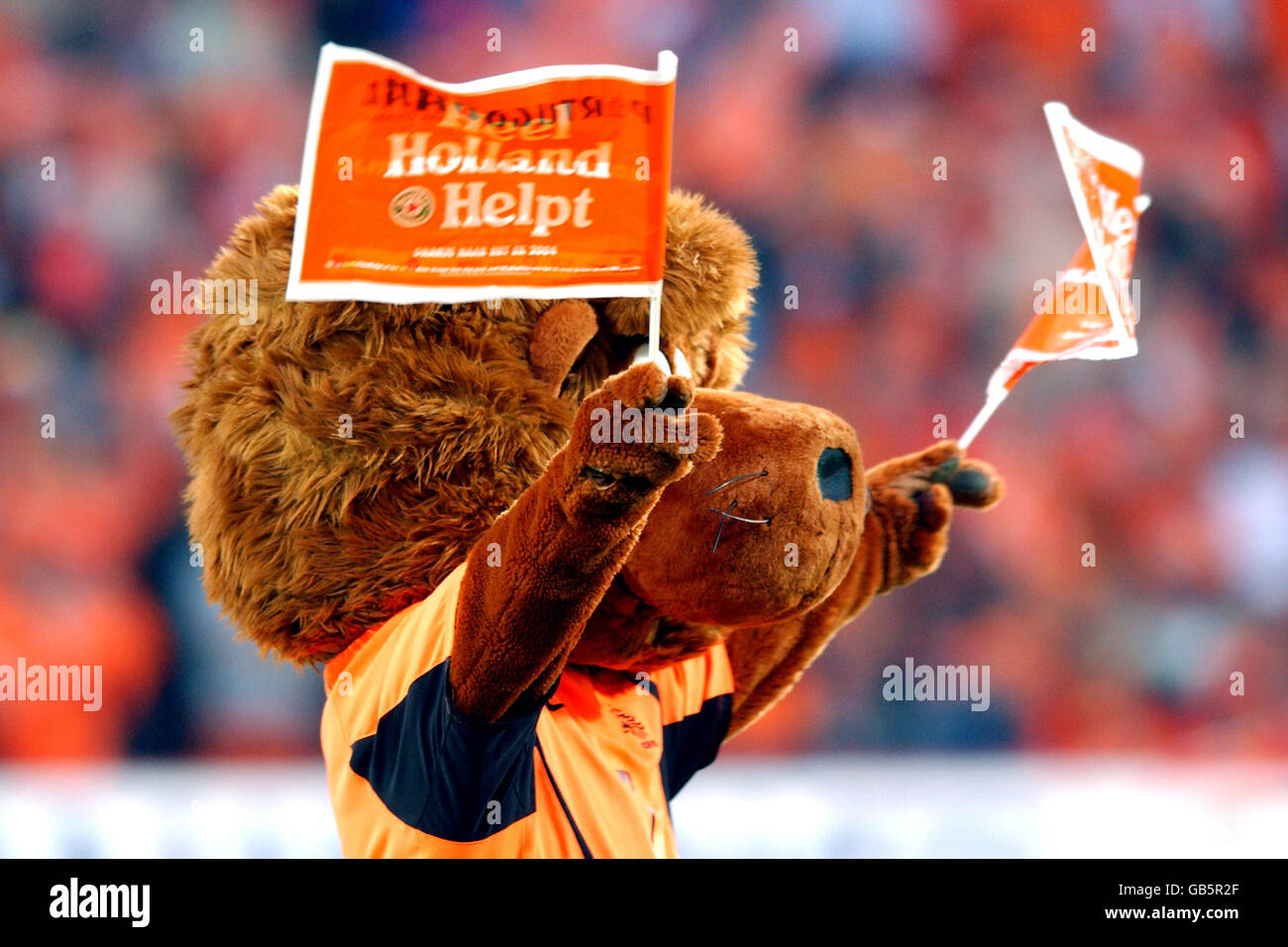 Soccer - European Championships 2004 Qualifier Group Three - Holland v Austria. Dutchy the Holland mascot waves to the crowd prior to the game with Austria Stock Photo