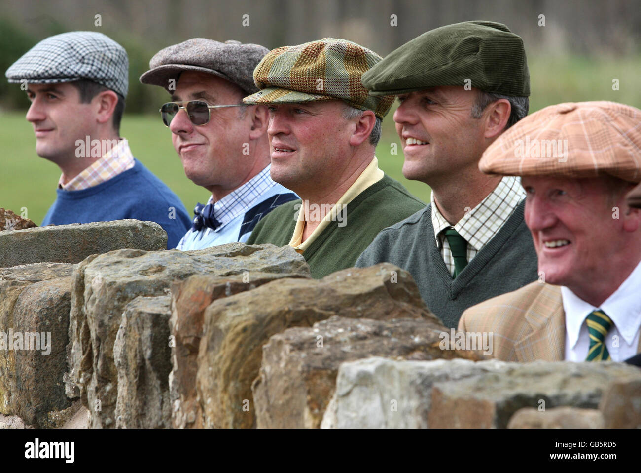 Golfers await the start of the World Hickory Open Golf Championship at Craigielaw Golf Club in Aberlady. Stock Photo