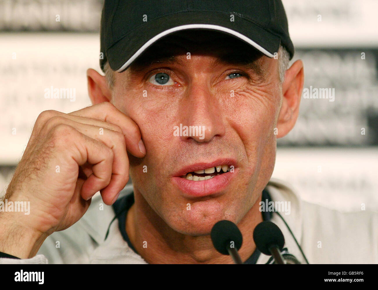 Yves Rossy, 49, also known as Fusionman, talks during a press conference in Dover, after his record breaking attempt to become the first person to fly solo across the English Channel using a single jet-propelled wing was cancelled because of bad weather. Stock Photo