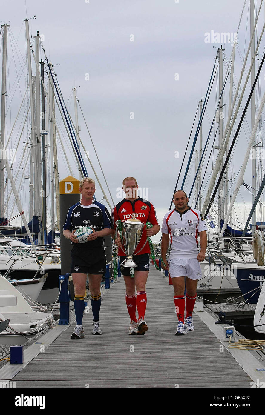 Leinster's Leo Cullen (left) with Munster's Paul O'Connell (centre) Ulster's Rory Best with the Heineken Cup during the Heineken Cup Launch at the marina near Cruzzo Restaurant in Malahide, Dublin, Ireland. Stock Photo