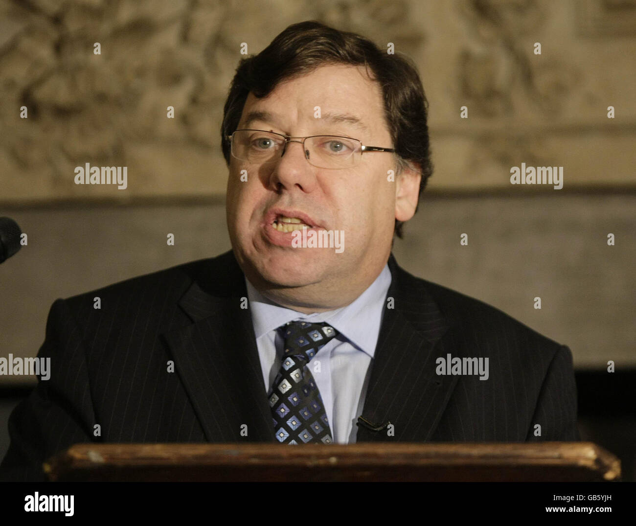 Taoiseach Brian Cowen addressing the IBEC-CBI Joint Business Conference in Trinity College, Dublin on the day President Mary McAleese signed emergency legislation to deal with the banking crisis. Stock Photo