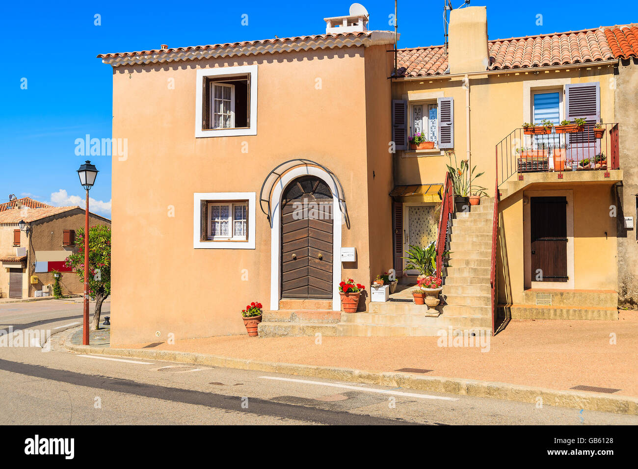 Street with typical French houses in Piana village, Corsica island, France Stock Photo