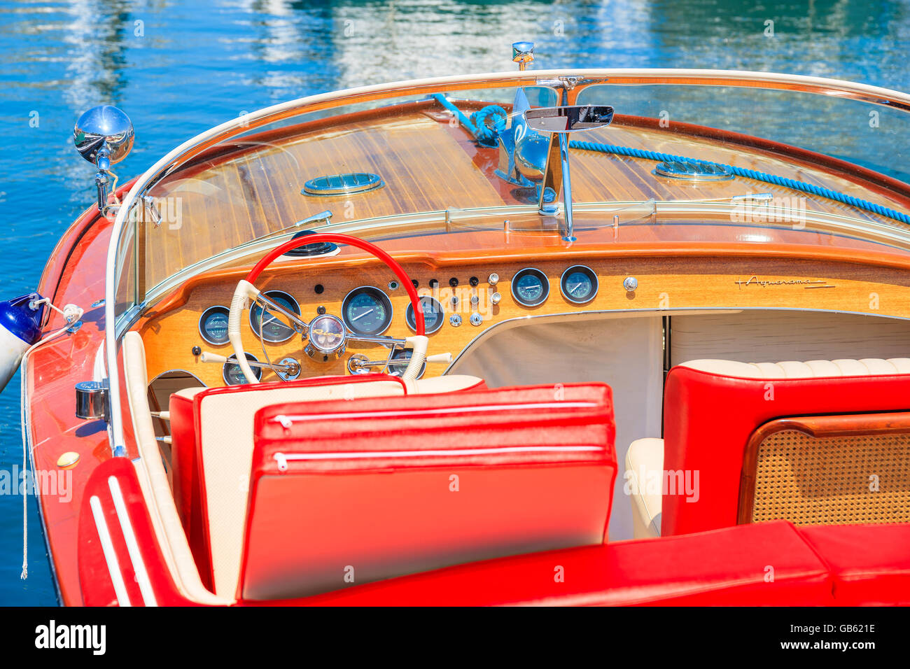CALVI PORT, CORSICA ISLAND - JUN 28, 2015: stylish retro motor boat mooring in Calvi marina on western coast of Corsica island, Stock Photo