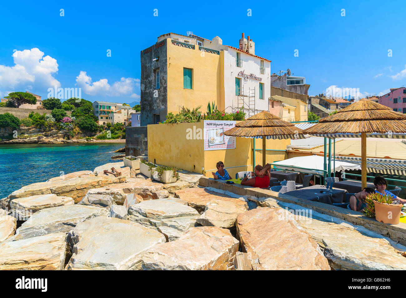 SAINT FLORENT, CORSICA ISLAND JUN 30, 2015tourist dining in