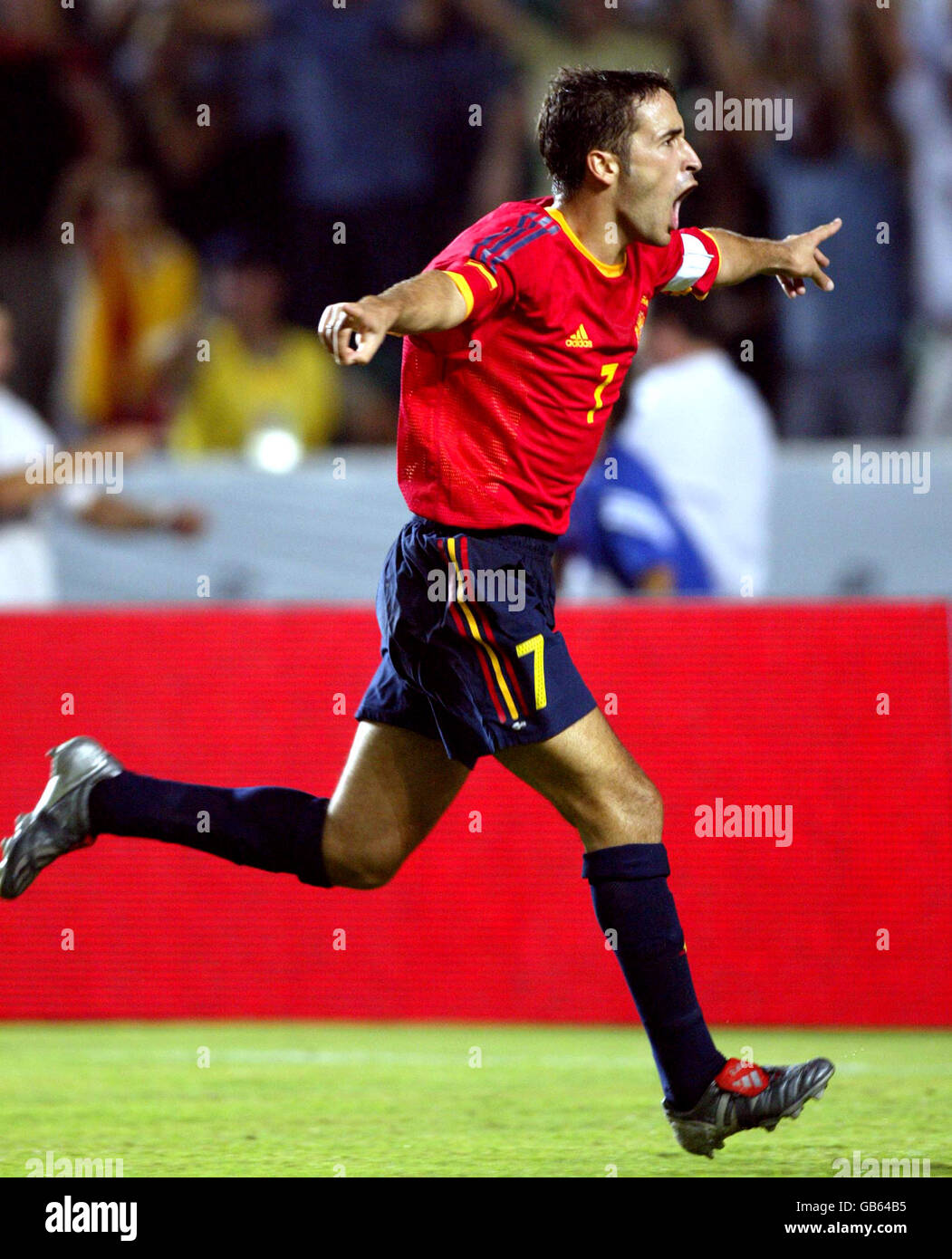 Spains raul celebrates goal against hi-res stock photography and