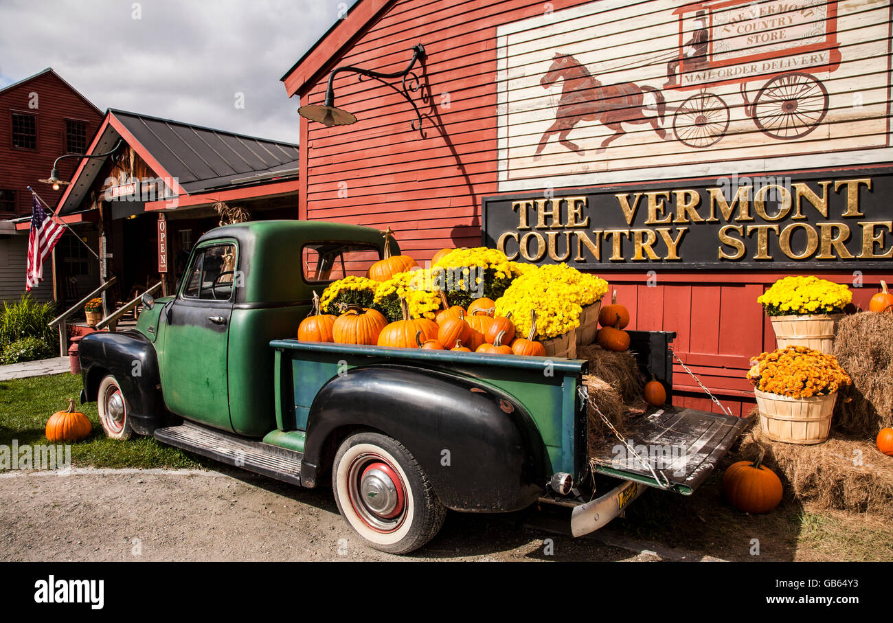 Colorful decoration outside at the Vermont country store antique 1953 Chevy pickup truck, Weston, Vermont, fall New England autumn colour VT, Oct 2014 Stock Photo