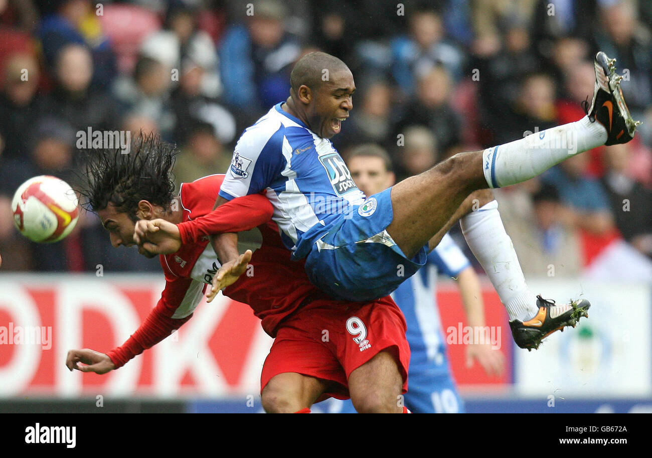 Middlesbrough's Mido and Wigan's Wilson Palacios during the Barclays Premier League match at the JJB Stadium, Wigan. Stock Photo