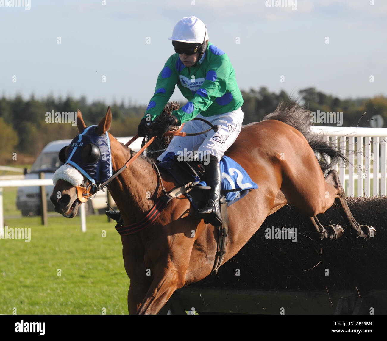 Lucky Luk and jockey Tom Siddall jump the last fence and go on to win ...