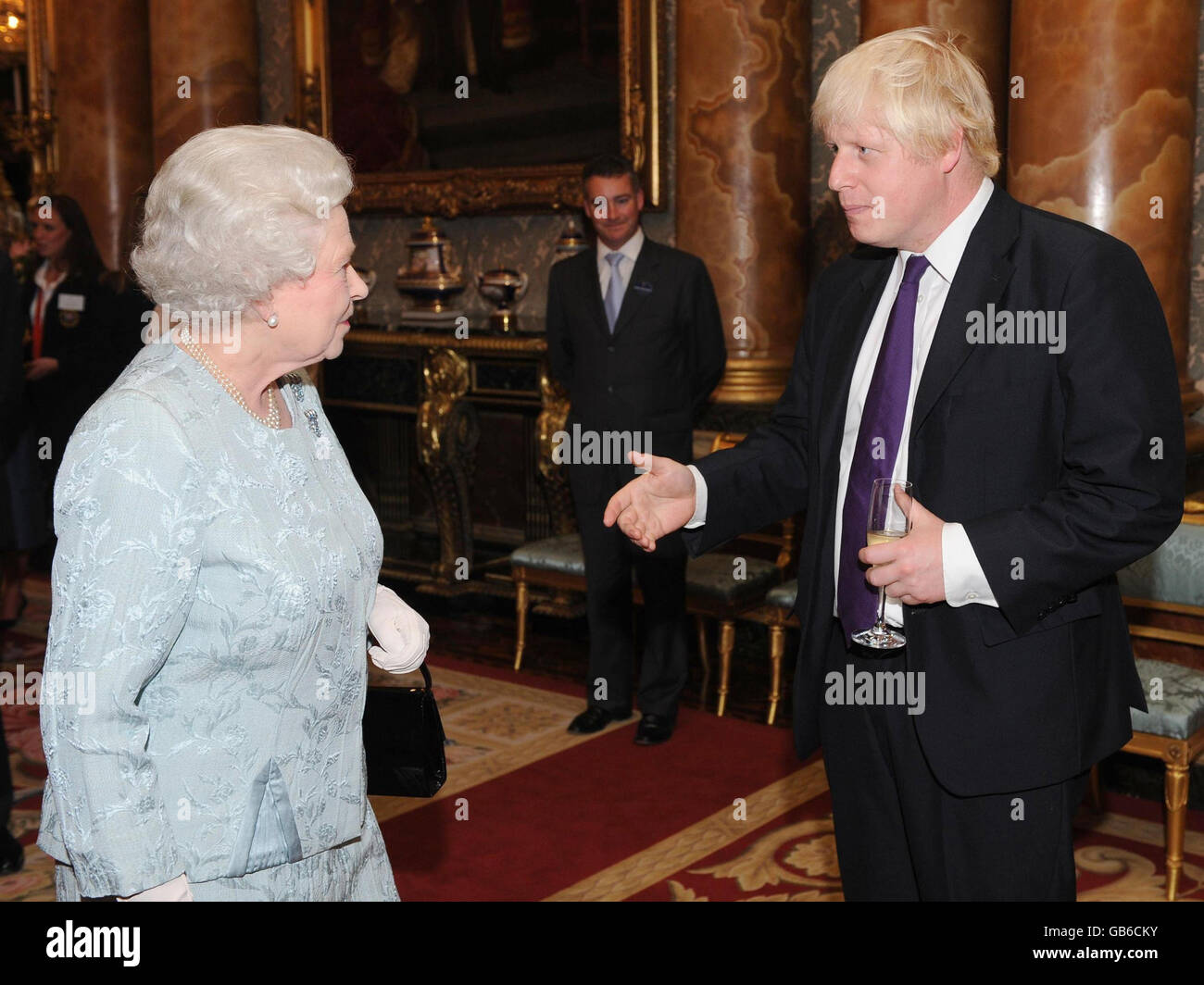 Britain's Queen Elizabeth II talks to London Mayor Boris Johnson during