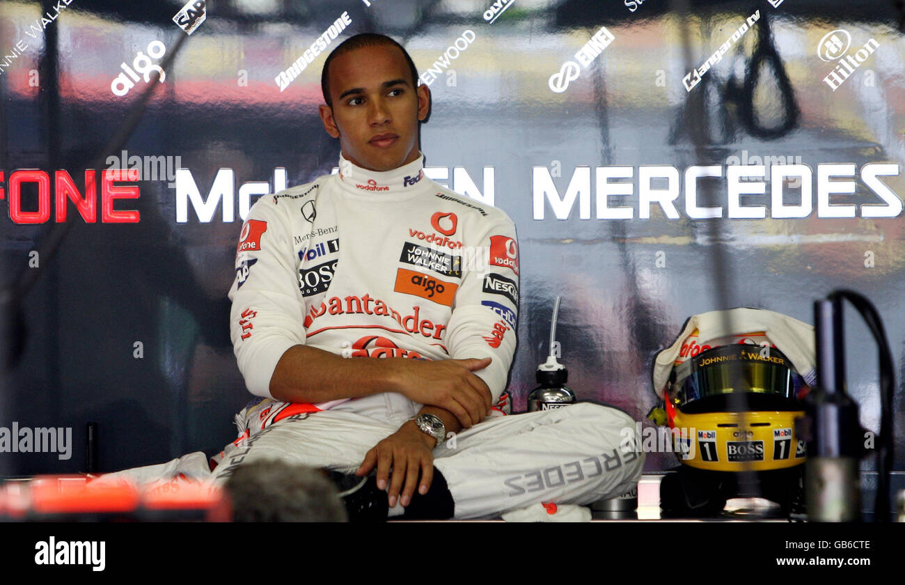 McLaren Mercedes driver Lewis Hamilton waits in the garage during first