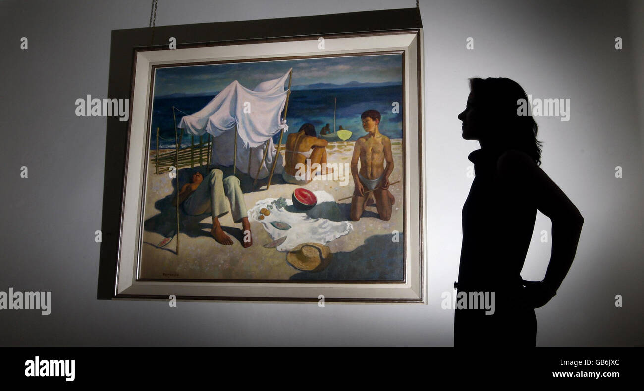 Employee Athina Athanasiadou with painting "Sun Worshippers" by the late artist Alberto Morrocco, which is being sold by Bourne Fine Art in Edinburgh. Stock Photo