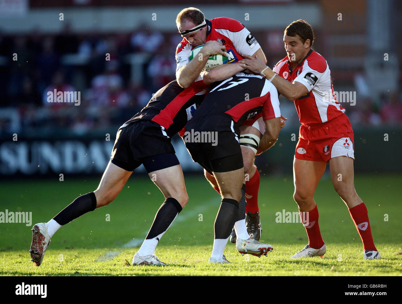 Gloucerster's Peter Buxton finds his way through the Biarritz defence during the Heineken Cup match at Kingsholm Stadium, Gloucester. Stock Photo