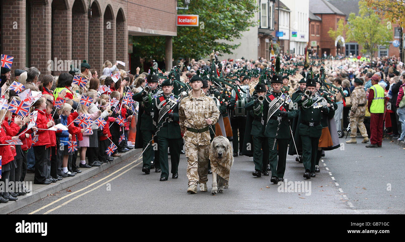 Members of the Royal Irish Regiment parade through Market Drayton, Shropshire, after returning home from Afghanistan. Stock Photo