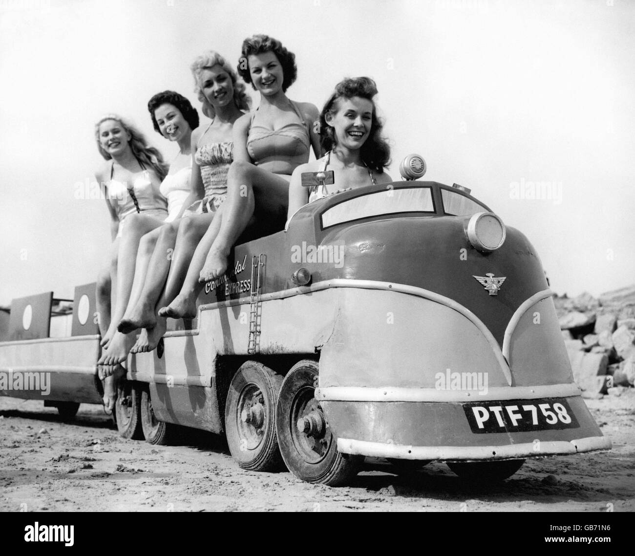 Girls have fun on the miniature train. From left, Delyse Humphreys, Sheila McGaffigan, Dianne Coltman, Patricia McHugh and Roberta Brown. Stock Photo
