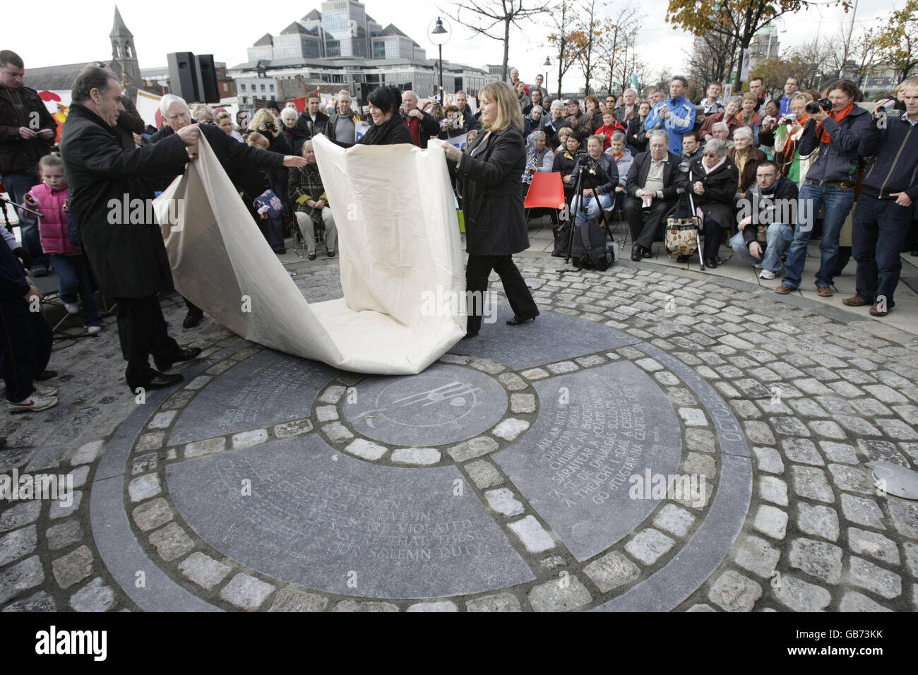 A World Poverty Stone is unveiled in Dublin near the Famine Memorial on Custom House Quay to mark the International Day for Eradication of Poverty. Stock Photo