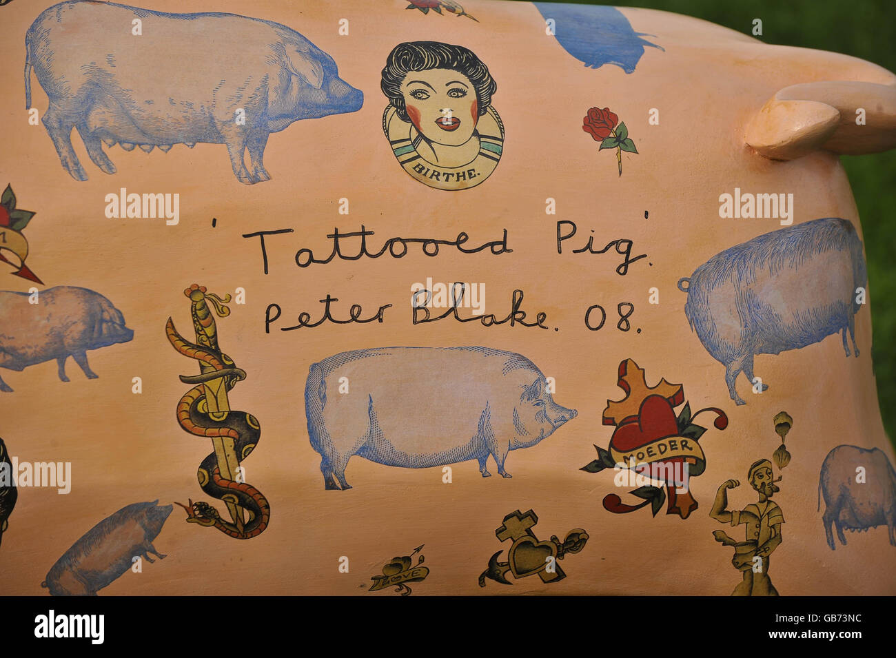 A signature on the back of one of the King Bladud's Pigs in Bath by Peter Blake, the artist that designed the Beatles Sgt Peppers album cover, on the lawn in front of the Royal Crescent in Bath. Stock Photo