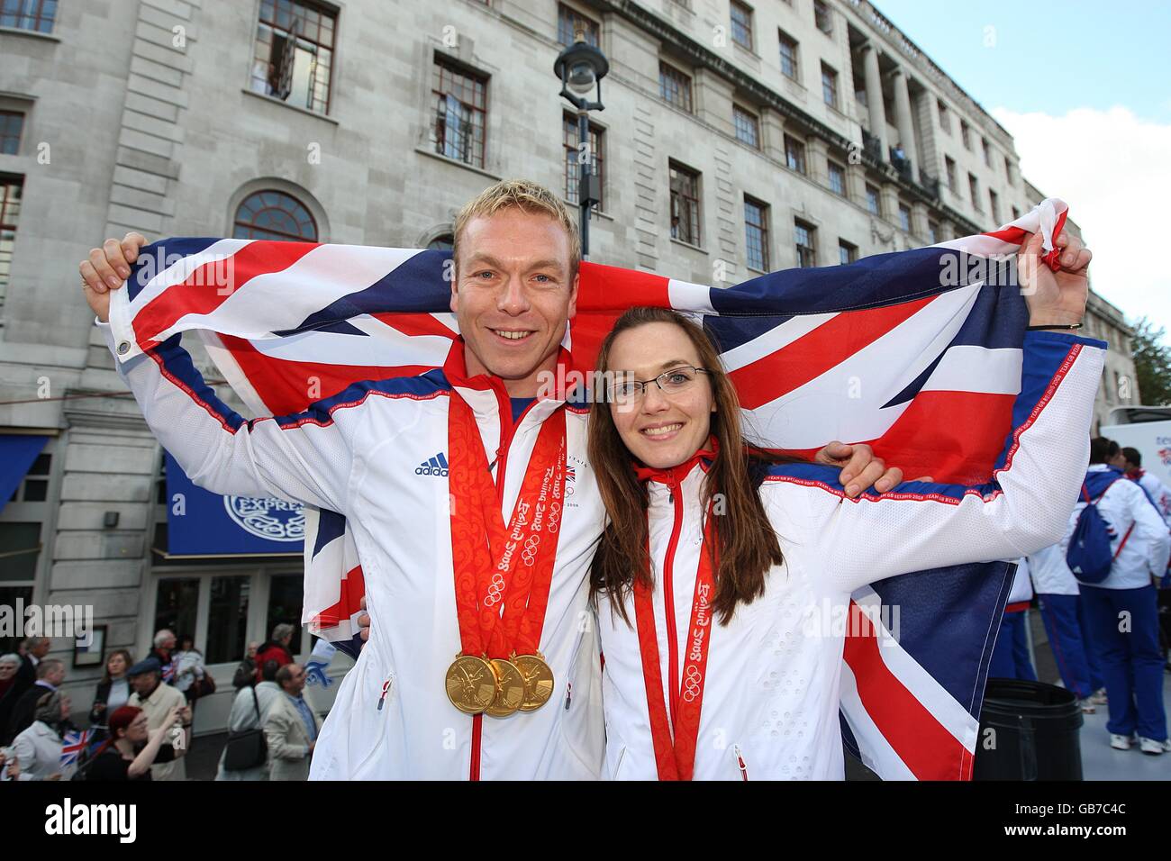 Olympic Medalist's Chris Hoy and Victoria Pendleton during the Team GB homecoming Parade in Central London Stock Photo