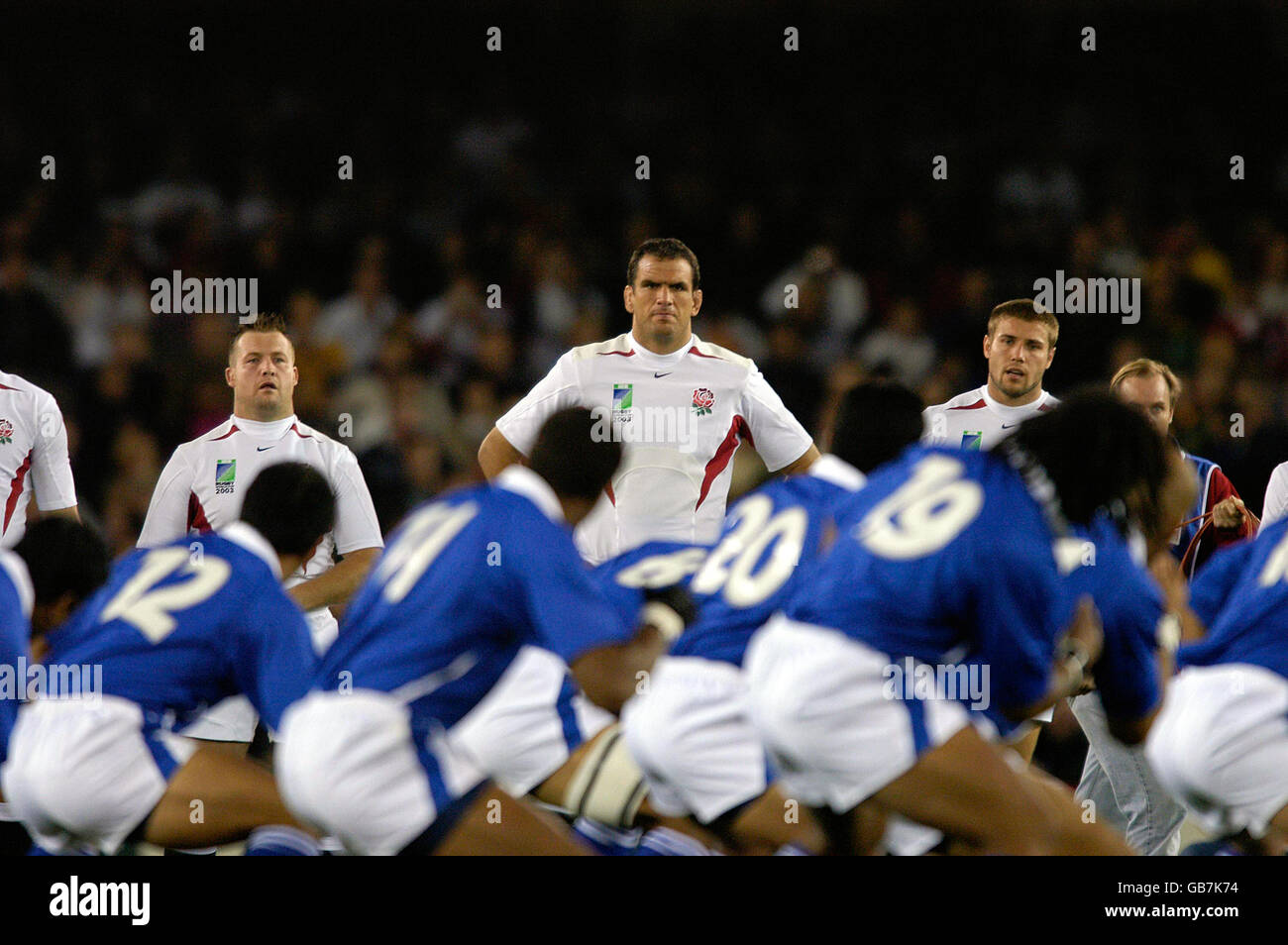 England's captain Martin Johnson stares down the Samoans during their traditional Manu Siva Tau dance Stock Photo