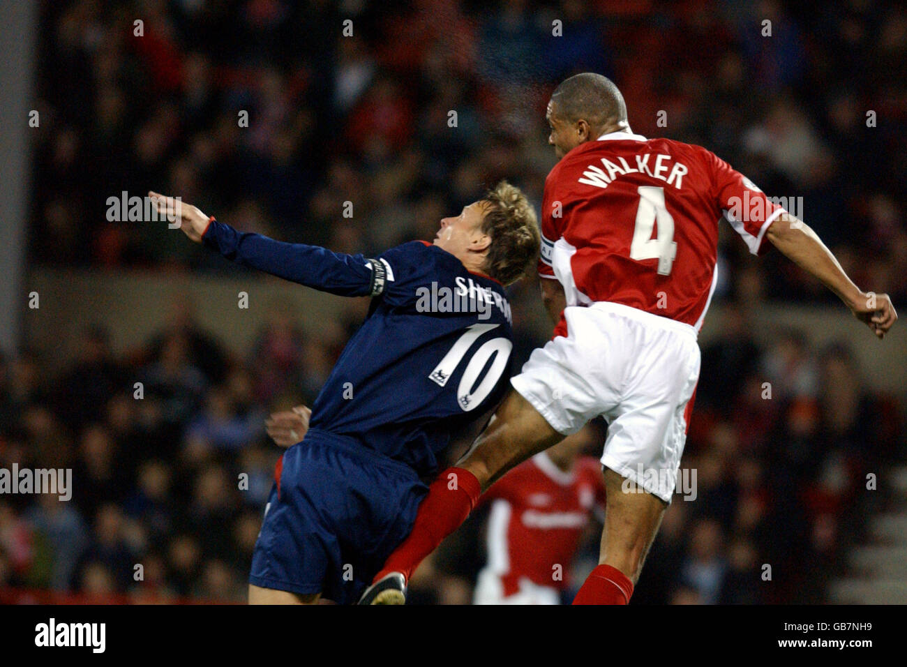 Nottingham Forest's Des Walker (r) and Portsmouth's Teddy Sheringham (l) battle for the ball in the air Stock Photo