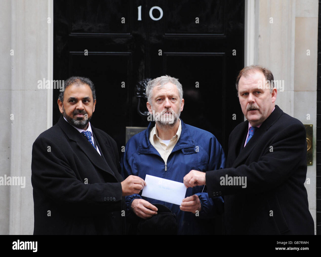 (left to right) Lord Ahmed, Jeremy Corbyn MP and Elfin Llwyd MP deliver a petition to Downing Street asking the Prime Minister to withdraw troops from Afghanistan. Stock Photo